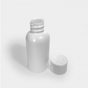 Oil bottle cap with integrated vertical dosing plug pre-assembled in cap
