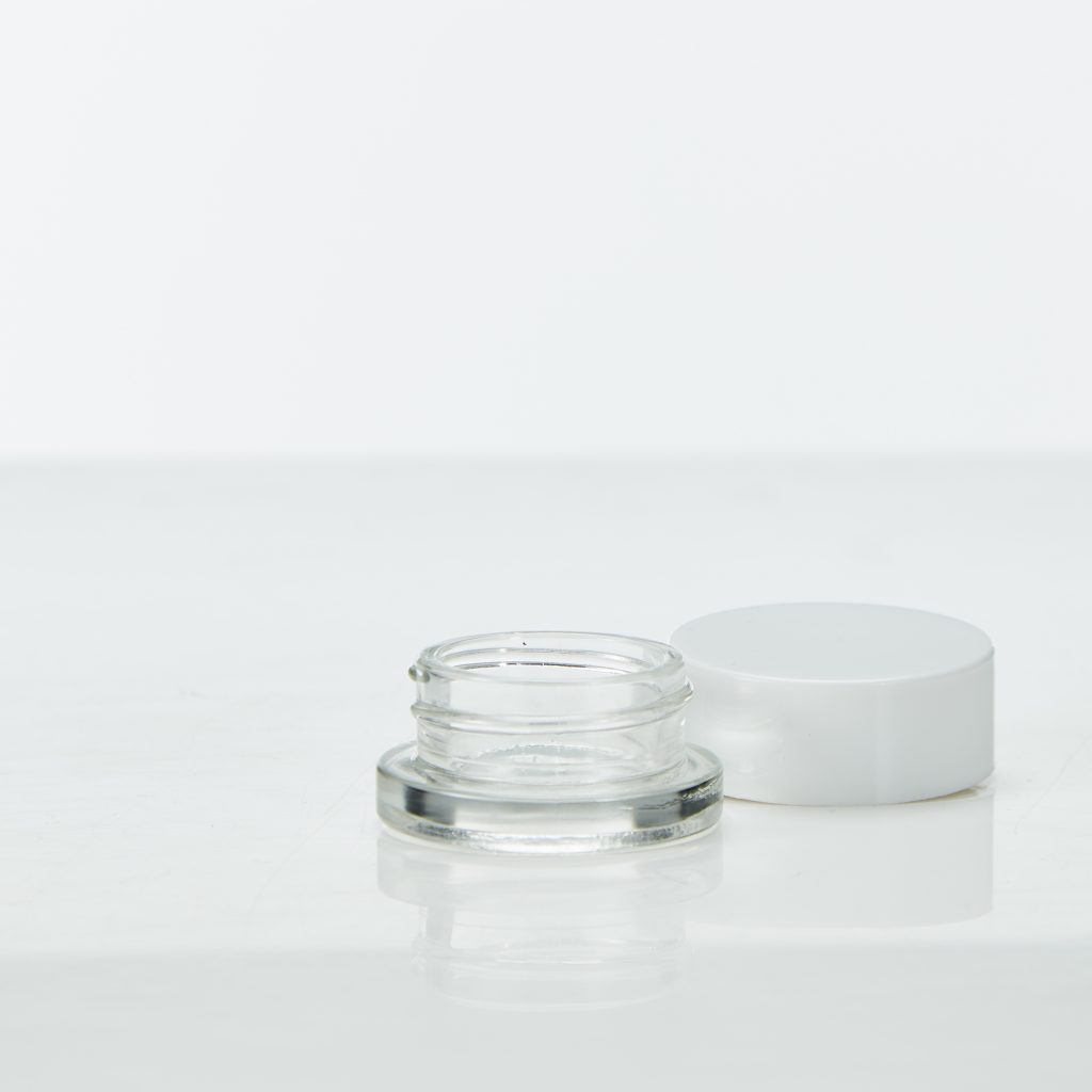 9ml clear glass concentrate jar with white smooth foil lined lid. Contact us to learn more about packaging solutions for concentrated extracts.